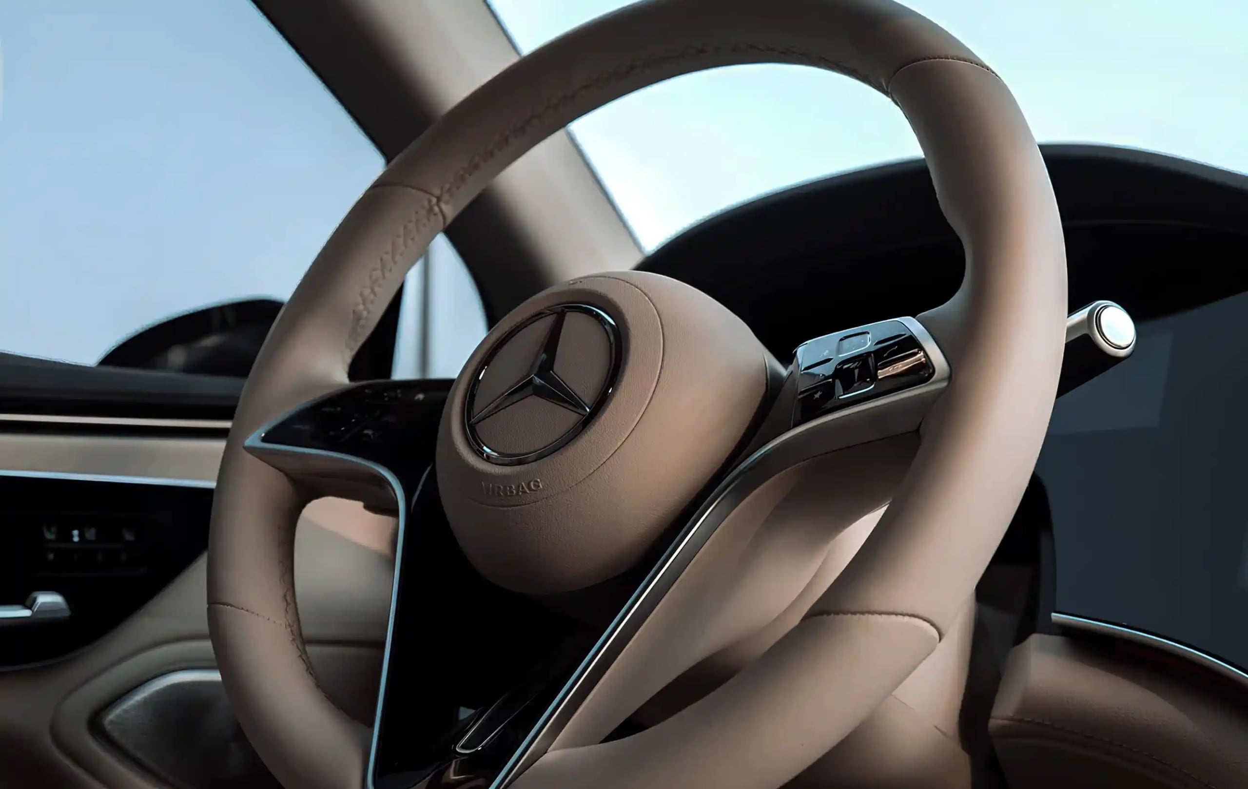 FAQ — фон с интерьером автомобиля и рулём Mercedes